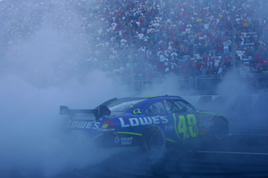 Jimmie Johnson celebrates after winning at Martinsville Speedway. (Photo Credit: Todd Warshaw/Getty Images for NASCAR)