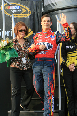 Carol Bickford and her son, Jeff Gordon, waves at the crowd at Darlington Raceway, where Gordon has won seven NASCAR Sprint Cup Series races (Photo Credit: Jerry Markland/Getty Images for NASCAR)