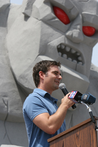 NASCAR Sprint Cup Series driver Jeff Gordon addresses an assembled crowd of dignitaries and race fans at Dover International Speedway on Wednesday as part of the Monster Monument dedication ceremony (Photo Credit: Dover Motorsports)