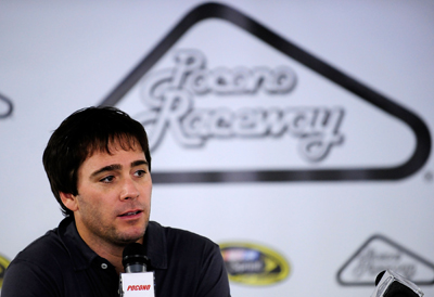 Jimmie Johnson talks with the media during NASCAR Sprint Cup Series testing at Pocono Raceway. (Photo Credit: Rusty Jarrett/Getty Images for NASCAR)