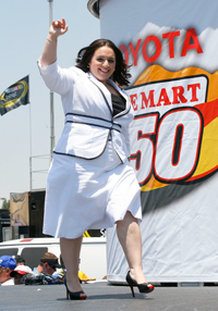 Actress Nikki Blonsky waves to the crowd after singing the National Anthem before the NASCAR Sprint Cup Series Toyota/Save Mart 350 at the Infineon Raceway on June 22, 2008 in Sonoma, California. (Photo by Geoff Burke/Getty Images for NASCAR)