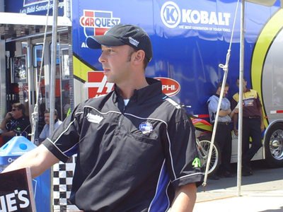 Chad Knaus walks the No. 48 Lowe's Chevrolet through inspection at Infineon Raceway
