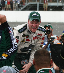 Dale Earnhardt Jr. celebrates winning the LifeLock 400 at Michigan International Speedway. The win ended a 76-race winless streak for Earnhardt. (Photo Credit: Jonathan Daniel/Getty Images)