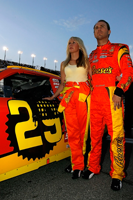 Kevin Harvick (R), driver of the #29 Reese's Chevrolet, stands with wife, DeLana (L), prior to the NASCAR Sprint Cup Series Coke Zero 400 at Daytona International Speedway on July 5, 2008 in Daytona Beach, Florida. (Photo by Jason Smith/Getty Images for NASCAR)
