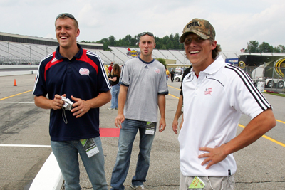 Adam Cristman, Brad Knighton, and Wells Thompson of Major League Soccer's New England Revolution walk the grid prior to the start of qualifying for the NASCAR Sprint Cup Series LENOX Industrial Tools 301 at New Hampshire Motor Speedway on June 27, 2008 in Loudon, New Hampshire. (Photo Credit: Jim McIsaac/Getty Images)