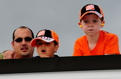 These fans of the No. 20 Home Depot were probably pretty happy with driver Tony Stewart's second-place finish in Sunday's NASCAR Sprint Cup Series Sunoco Red Cross Pennsylvania 500 at Pocono Raceway. (Photo Credit: Rusty Jarrett/Getty Images for NASCAR)