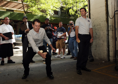 Kyle Busch tries to catch a scoop of ice cream on a cone while practicing to break a Guiness World Record on Live With Regis And Kelly. (Photo Credit: Mike Stobe/Getty Images for NASCAR)