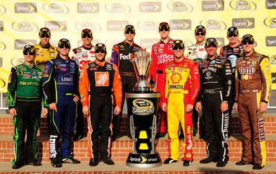The 2008 Chase for the NASCAR Sprint Cup field poses with the Sprint Cup trophy after the Chevy Rock & Roll 400 at Richmond International Raceway. The drivers are (Back row L-R) Matt Kenseth, Greg Biffle, Denny Hamlin, Carl Edwards, Dale Earnhardt Jr., Jeff Burton (Front row L-R) Jeff Gordon, Jimmie Johnson, Tony Stewart, Kevin Harvick, Clint Bowyer and Kyle Busch. (Photo Credit: Rusty Jarrett/Getty Images for NASCAR)