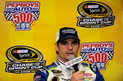 Jeff Gordon, driver of the No. 24 DuPont/Nicorette White Ice Mint Chevrolet, speaks with the media prior to practice for the NASCAR Sprint Cup Series Pep Boys Auto 500 at Atlanta Motor Speedway. (Photo Credit: Rusty Jarrett/Getty Images for NASCAR)