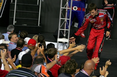 Kasey Kahne greets fans during pre-race introductions for the Bank of America 500 at Lowe's Motor Speedway. (Photo Credit: Todd Warshaw/Getty Images for NASCAR)