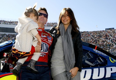 Jeff Gordon (C), driver of the #24 DuPont Chevrolet, stands on the grid with his wife Ingrid Vandebosch (R), and daughter Ella Sophia (L), prior to the start of the NASCAR Sprint Cup Series TUMS QuikPak 500 at Martinsville Speedway on October 19, 2008 in Martinsville, Virginia. (Photo by Jason Smith/Getty Images for NASCAR)
