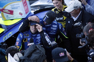 Crew chief Chad Knaus congratulates his driver Jimmie Johnson on winning the TUMS QuikPak 500 at Martinsvile Speedway on Sunday, October 19, 2008 (Courtesy Hendrick Motorsports)