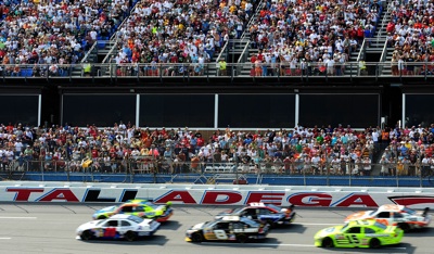 Pole-sitter Travis Kvapil (No. 28) leads the field at the start of the NASCAR Sprint Cup Series AMP Energy 500 on Sunday at Talladega Superspeedway in Talladega, Ala. (Photo Credit: Rusty Jarrett/Getty Images for NASCAR)