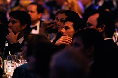 Actor Tom Cruise watches the NASCAR Sprint Cup Series Awards Ceremony while sitting at Jeff Gordon's table Friday night at the Waldorf=Astoria in New York City. (Photo Credit: Rusty Jarrett/Getty Images for NASCAR)