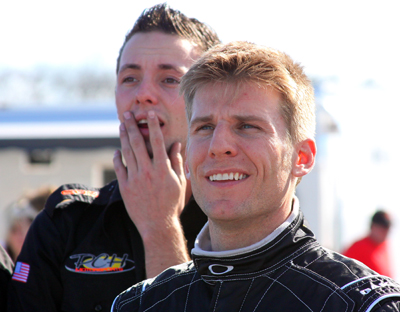 Jamie McMurray shares a fun moment with a member of his team during Daytona KartWeek By Cometic Gasket at Daytona International Speedway. (Photo Credit: Motorsports Images & Archives)