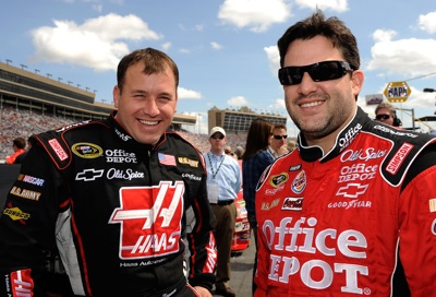 Ryan Newman, driver of the No. 39 Haas Automation Chevrolet shares a laugh with his car owner and driver of the No. 14 Office Depot/Old Spice Chevrolet, Tony Stewart, prior to Sunday's start of the NASCAR Sprint Cup Series Kobalt Tools 500 at the Atlanta Motor Speedway in Hampton, Ga. (Photo Credit: Rusty Jarrett/Getty Images for NASCAR)