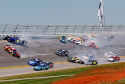 A multi-car incident involving 14 cars in Turn 4 brought out the first caution on lap 8 of Sunday's NASCAR Sprint Cup Series Aaron's 499 at Talladega Superspeedway. (Photo Credit: John Harrelson/Getty Images)