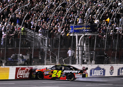 Jeff Gordon battled Kyle Busch and Ryan Newman three-wide during the 10-lap shootout before spinning and hitting the wall, ending his night eight laps short of the finish. (Photo Credit: John Harrelson/Getty Images)