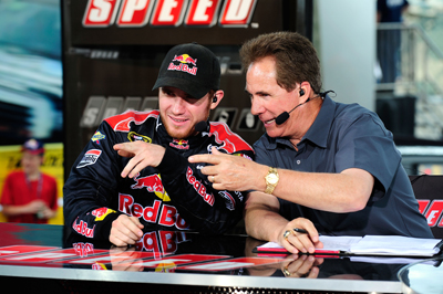 Pole-sitter Brian Vickers and Darrell Waltrip joke with fans during 