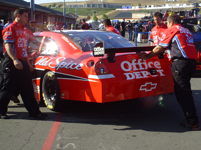 Crew members push the No. 14 Office Depot/Old Spice Chevrolet out of their garage stall during Sprint Cup practice sessions at Infineon Raceway on Saturday, June 20, 2009 (photo credit: The Fast and the Fabulous)