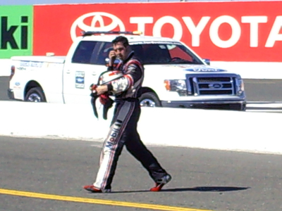 Sam Hornish Jr. attempts to walk to his pit stall after an incident on the track took him out of the race during the Toyota/SaveMart 350 at Infineon Raceway on Sunday, June 21, 2009 (photo credit: The Fast and the Fabulous)
