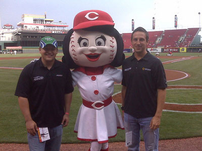 Stephen Leicht and Erik Darnell hanging out with Rosie Red prior to the game as a part of Kentucky Speedway Media Day in Cincinnati. (photo credit: Nationwide)
