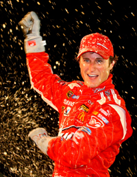 Kasey Kahne, driver of the No. 9 Budweiser Dodge and sixth in points in the standings, celebrates in Victory Lane after winning the NASCAR Sprint Cup Series Pep Boys Auto 500 at Atlanta Motor Speedway on Sunday. (Photo Credit: Jason Smith/Getty Images for NASCAR)