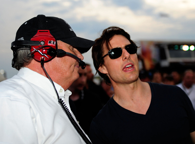 Actor Tom Cruise stands in the pits with NASCAR team owner Rick Hendrick, just before the start of Sunday's NASCAR Sprint Cup Series Pep Boys Auto 500 at Atlanta Motor Speedway. Cruise, who has become a familiar face at NASCAR races this season, will narrate an upcoming documentary about Hendrick that will cronicle the racing veteran's 25 years in the sport. (Photo Credit: Rusty Jarrett/Getty Images for NASCAR)