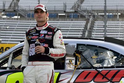 Jeff Gordon leans against his car while waiting to qualify for the TUMS Fast Relief 500 at Martinsville Speedway. Gordon will start Sunday's race from the outside pole. (Photo Credit: Jason Smith/Getty Images for NASCAR)
