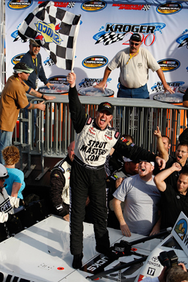 Timothy Peters celebrates winning the Kroger 200 at Martinsville Speedway, his hometown track. The win was Peters' first in the NASCAR Camping World Truck Series. (Photo Credit: Streeter Lecka/Getty Images)