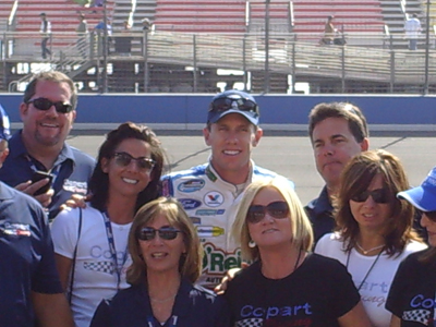 Carl Edwards takes a group photo with his new sponsor in the Nationwide Series for 16 races in 2010 the Copart 300 on Saturday, October 10, 2009 at Auto Club Speedway in Fontana, CA (photo credit: The Fast and the Fabulous)