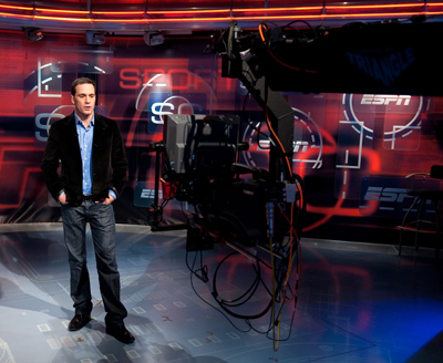 NASCAR Sprint Cup Series champion Jimmie Johnson records a tease for SportsCenter during a visit Monday to the Bristol, Conn. campus of ESPN, only hours after becoming the first driver to win four consecutive titles. (Photo Credit: Joe Faraoni/ESPN)
