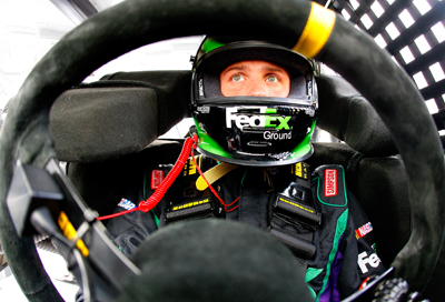 Denny Hamlin sits in his car waiting for practice to start for the Checker O'Reilly Auto Parts 500 presented by Pennzoil at Phoenix International Raceway. (Photo Credit: Jason Smith/Getty Images for NASCAR)