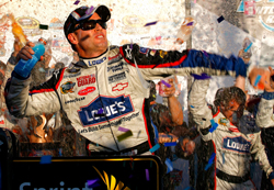 Jimmie Johnson celebrates winning the Checker O'Reilly Auto Parts 500 presented by Pennzoil at Phoenix International Raceway, his seventh victory of 2009. (Photo Credit: Jason Smith/Getty Images for NASCAR)