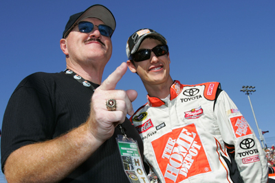 Joey Logano poses with honorary race official Sgt. Slaughter prior to the Checker O'Reilly Auto Parts 500 presented by Pennzoil at Phoenix International Raceway. (Photo Credit: Rusty Jarrett/Getty Images for NASCAR)