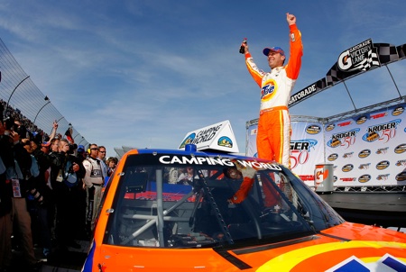 Kevin Harvick celebrates winning the Kroger 250 at Martinsville Speedway, his fourth consecutive victory in the NASCAR Camping World Truck Series. (Credit: Jason Smith/Getty Images for NASCAR)