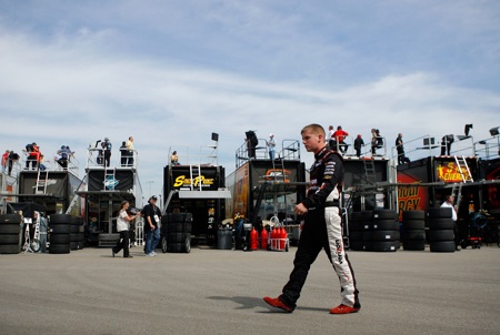 Justin Allgaier, driver of the #12 Verizon Wireless Dodge walks in the garage area during practice for the NASCAR Nationwide Series Nashville 300. (Credit: Jason Smith/Getty Images for NASCAR)