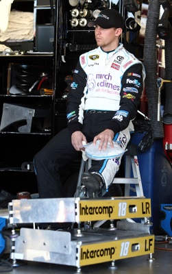 Denny Hamlin ices his knee in the garage after turning the quickest lap in the first practice for the Subway Fresh Fit 600 at Phoenix International Raceway.(Credit: Jonathan Ferrey/Getty Images)