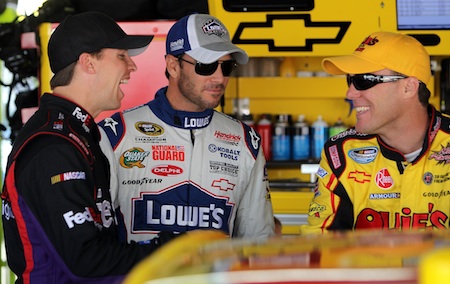 Denny Hamlin, Jimmie Johnson and Kevin Harvick share a laugh during Saturday’s practice at the Monster Mile.