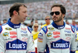 (Left to right) Crew chief Chad Knaus talks with Jimmie Johnson before the NASCAR Sprint Cup Series LENOX Industrial Tools 301 at New Hampshire Motor Speedway Sunday in Loudon, N.H. (Credit: Rusty Jarrett/Getty Images for NASCAR)