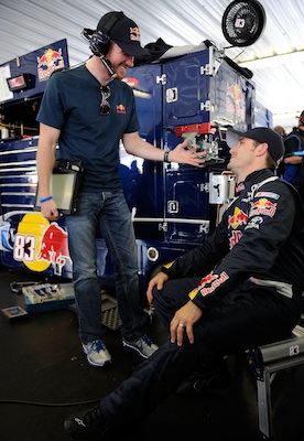 Brian Vickers goes over practice notes with teammate Casey Mears, who is driving the No. 83 Red Bull Toyota now that Vickers is out for the season with a medical issue. (Credit: Rusty Jarrett/Getty Images for NASCAR)