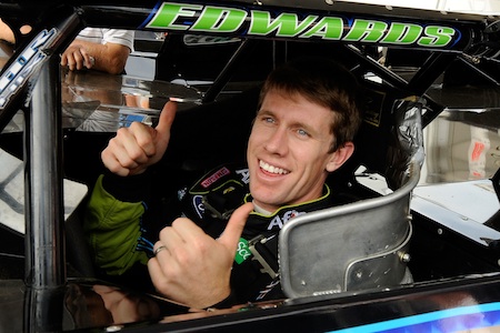 Carl Edwards, driver of the #99 Aflac late model Ford, sits in his car during the Gillette Fusion ProGlide Prelude to the Dream at Eldora Speedway on June 9, 2010 in Rossburg, Ohio. (Photo by John Harrelson/Getty Images for True Speed Communication)