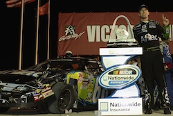 Carl Edwards driver of the #60 Aflac Ford poses with the trophy after winning the NASCAR Nationwide Series Missouri-Illinois Dodge Dealers 250 at Gateway International Raceway on July 17, 2010 in Madison, Illinois.  (Photo by Dilip Vishwanat/Getty Images for NASCAR)