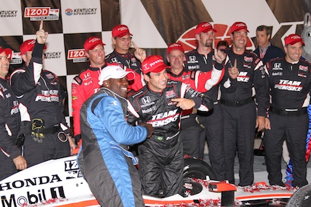 Terrell Owens celebrates in Victory Lane with Helio Castroneves