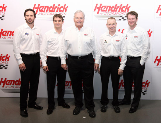 (Left to right) Five-time NASCAR Sprint Cup Series champion Jimmie Johnson, four-time NASCAR Sprint Cup Series champion Jeff Gordon, owner Rick Hendrick and NASCAR Sprint Cup Series drivers Mark Martin and Dale Earnhardt Jr. pose for a team picture Wednesday at Hendrick Motorsports Media Day during the Sprint Media Tour hosted by Charlotte Motor Speedway.(Credit: Jason Smith/Getty Images for NASCAR)