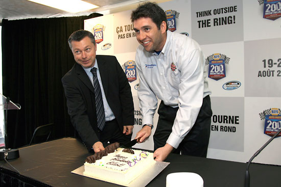 François Dumontier, president, NAPA Auto Parts 200 presented by Dodge, presents Elliott Sadler with a birthday cake in Montreal. Sadler's 36th birthday is April 30. (Credit: Muriel Broussseau Photo)