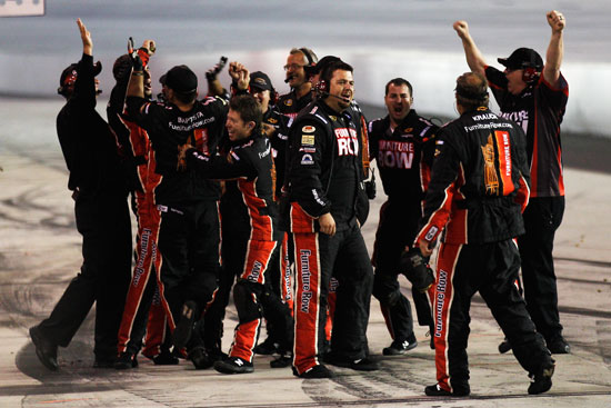 The No.78 team celebrates Regan Smith and Furniture Row's first NASCAR Sprint Cup Series victory at Darlington Raceway (Credit: Chris Graythen/Getty Images for NASCAR)