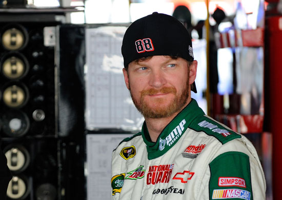 Dale Earnhardt Jr., driver of the No. 88 Amp Energy Sugar Free and National Guard Chevrolet, stands in the garage during practice for the NASCAR Sprint Cup Series FedEx 400 Benefiting Autism Speaks at Dover International Speedway on May 13 in Dover, Del. (Credit: Jared C. Tilton, Getty Images for NASCAR)