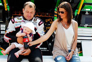 Ryan Newman, driver of the #39 Haas Automation Chevrolet, his wife Krissie Newman and their daughter Brooklyn Sage Newman sits together prior to the NASCAR Sprint Cup Series STP 400 at Kansas Speedway on June 5, 2011 in Kansas City, Kansas. (Photo by Geoff Burke/Getty Images for NASCAR) 