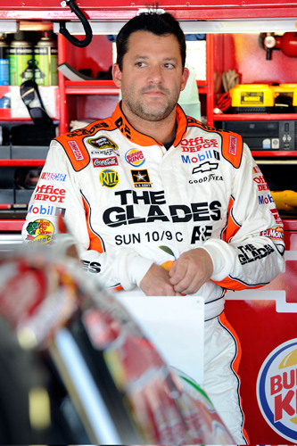 Riding with primary sponsor "The Glades," premiering Sunday on A&E, Tony Stewart was fourth-fastest in Friday's first NASCAR Sprint Cup Series practice at Kansas Speedway in Kansas City, Kan. (Credit: John Harrelson/Getty Images for NASCAR)